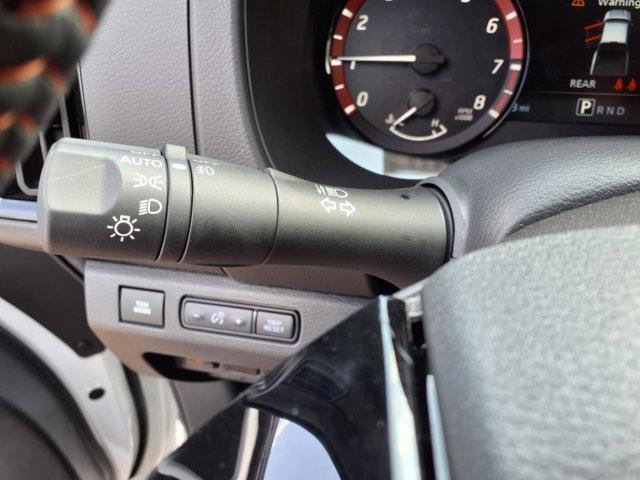 Photo of 2025 Glacier White Nissan Frontier