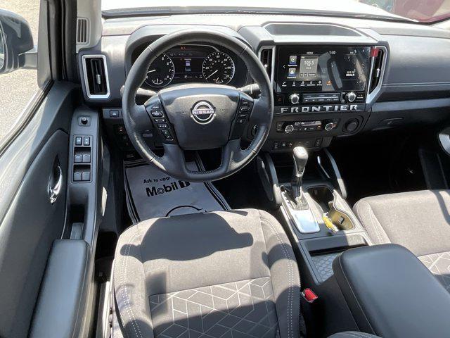 Photo of 2025 Glacier White Nissan Frontier