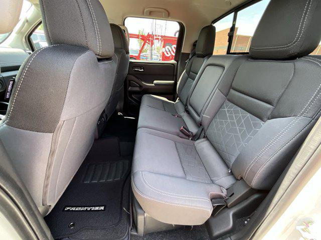 Photo of 2025 Glacier White Nissan Frontier