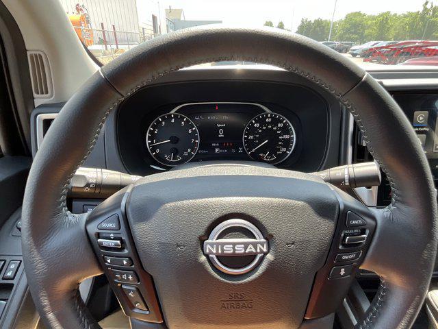 Photo of 2025 Glacier White Nissan Frontier