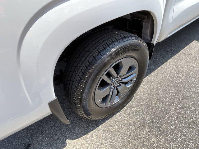 Photo of 2025 Glacier White Nissan Frontier