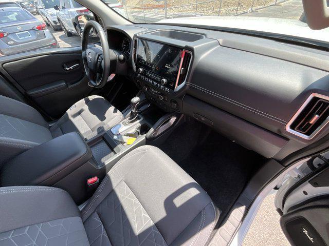 Photo of 2025 Glacier White Nissan Frontier