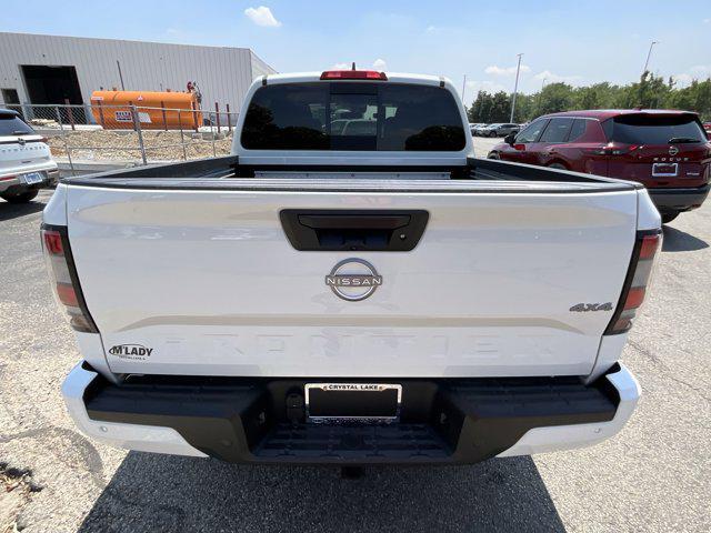 Photo of 2025 Glacier White Nissan Frontier