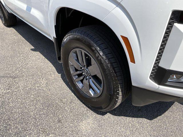 Photo of 2025 Glacier White Nissan Frontier