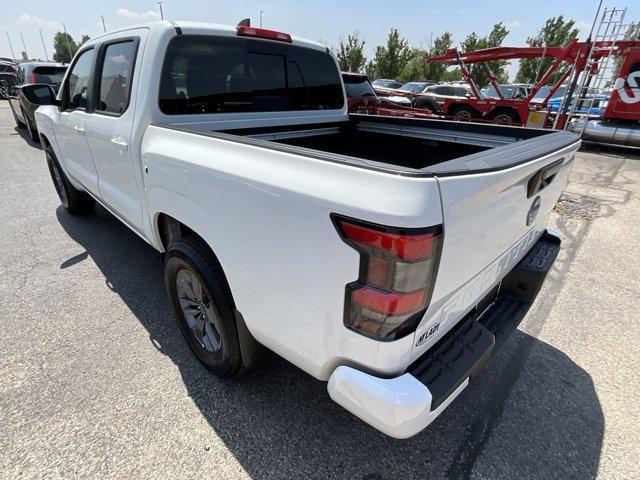 Photo of 2025 Glacier White Nissan Frontier
