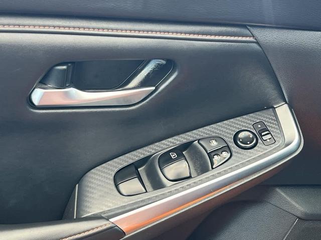 Photo of 2023 Monarch Orange Metallic/Super Black Nissan Sentra