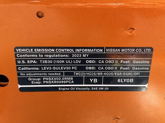 Photo of 2023 Monarch Orange Metallic/Super Black Nissan Sentra