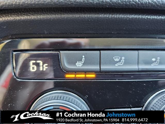 Photo of 2024 White Volkswagen Taos
