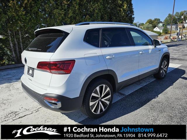 Photo of 2024 White Volkswagen Taos