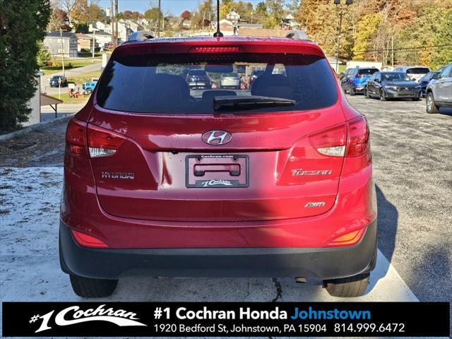 Photo of 2011 Garnet Red Hyundai TUCSON