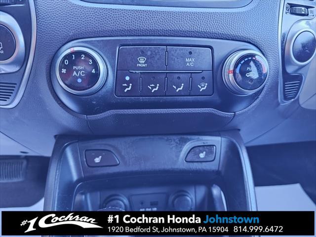Photo of 2011 Garnet Red Hyundai TUCSON