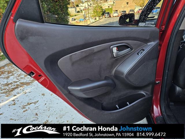 Photo of 2011 Garnet Red Hyundai TUCSON