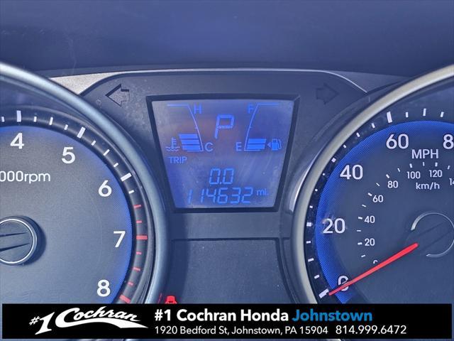 Photo of 2011 Garnet Red Hyundai TUCSON