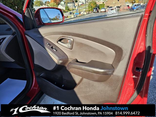 Photo of 2011 Garnet Red Hyundai TUCSON