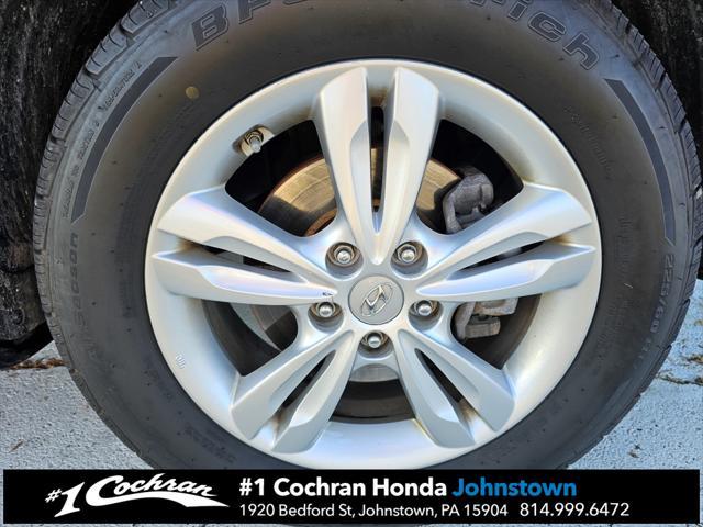 Photo of 2011 Garnet Red Hyundai TUCSON