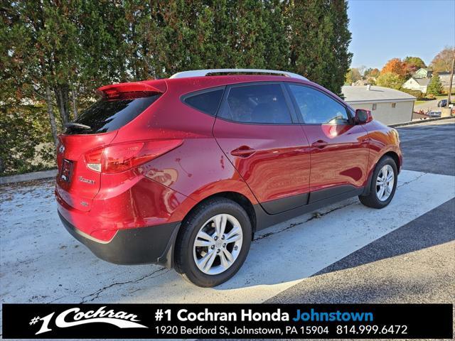 Photo of 2011 Garnet Red Hyundai TUCSON