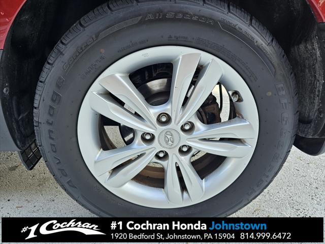 Photo of 2011 Garnet Red Hyundai TUCSON