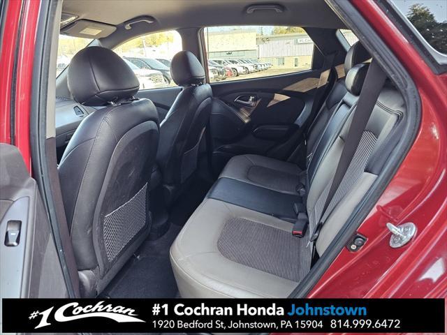 Photo of 2011 Garnet Red Hyundai TUCSON