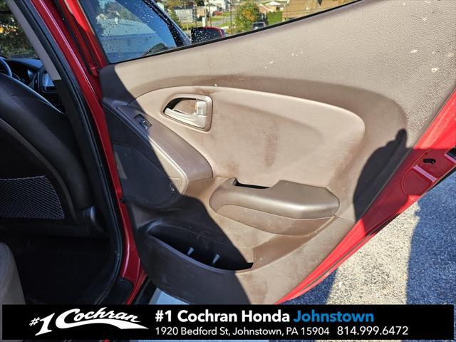 Photo of 2011 Garnet Red Hyundai TUCSON