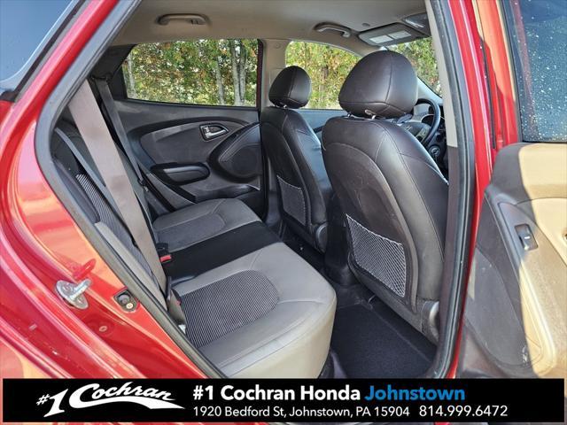 Photo of 2011 Garnet Red Hyundai TUCSON