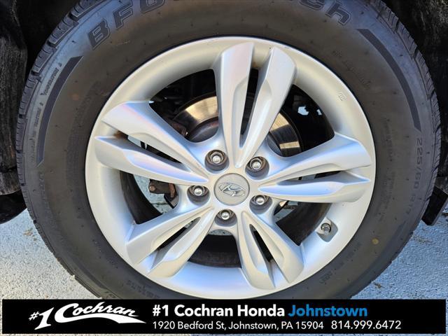 Photo of 2011 Garnet Red Hyundai TUCSON