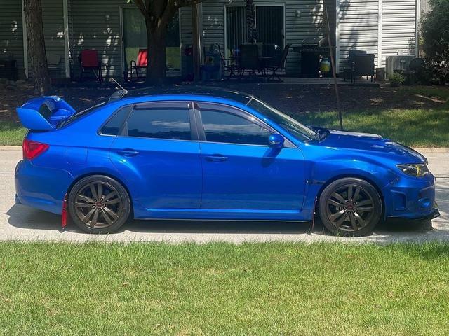 Photo of 2012 WR Blue Pearl Subaru Impreza WRX STi