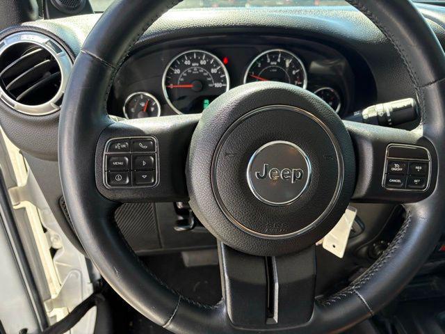 Photo of 2012 Bright White Clearcoat Jeep Wrangler Unlimited