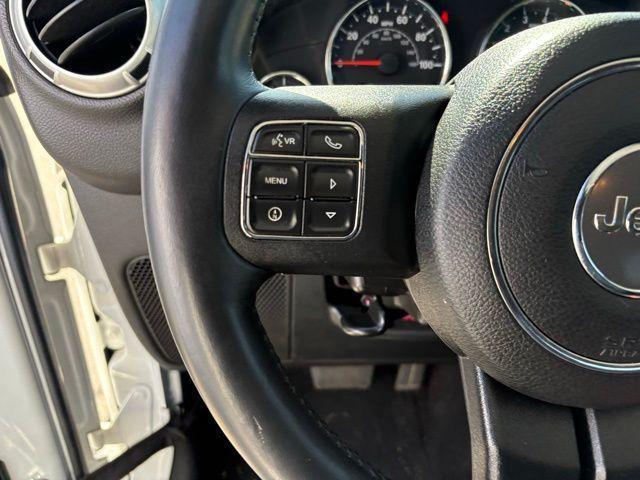Photo of 2012 Bright White Clearcoat Jeep Wrangler Unlimited