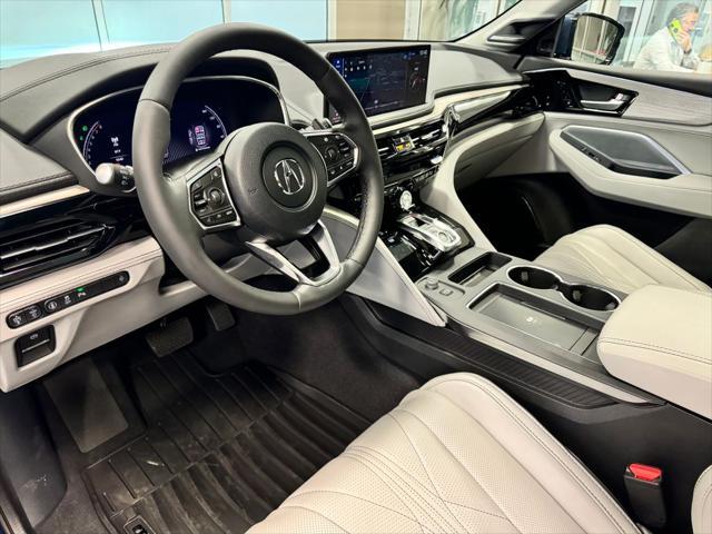 Photo of 2026 Canyon River Blue Acura MDX