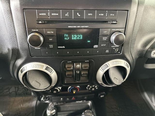 Photo of 2017 Granite Crystal Metallic Clearcoat Jeep Wrangler Unlimited