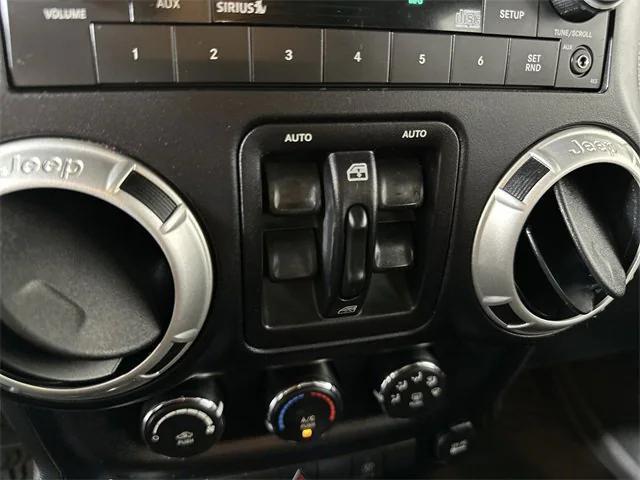 Photo of 2017 Granite Crystal Metallic Clearcoat Jeep Wrangler Unlimited