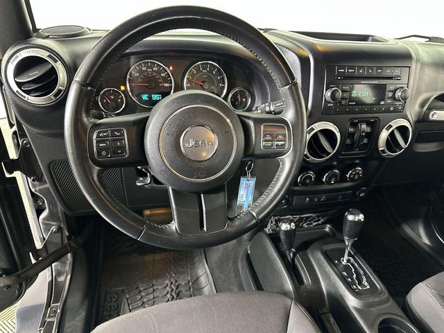 Photo of 2017 Granite Crystal Metallic Clearcoat Jeep Wrangler Unlimited