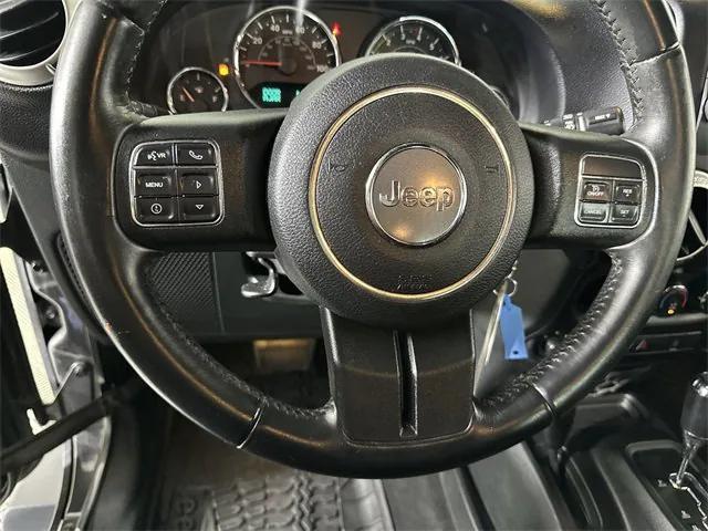 Photo of 2017 Granite Crystal Metallic Clearcoat Jeep Wrangler Unlimited