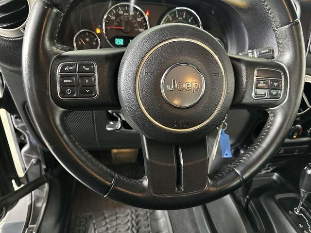 Photo of 2017 Granite Crystal Metallic Clearcoat Jeep Wrangler Unlimited