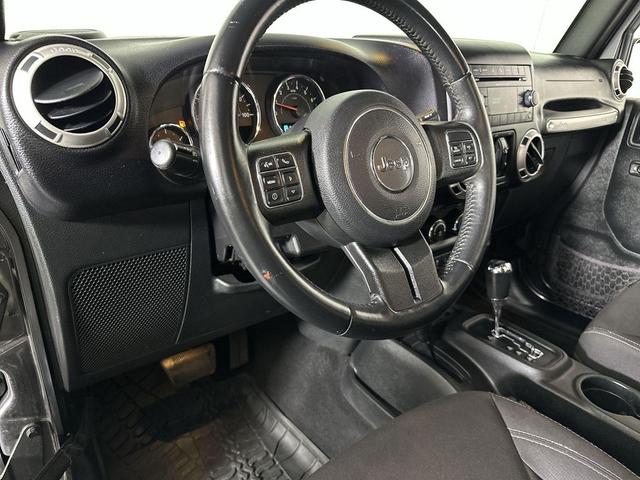 Photo of 2017 Granite Crystal Metallic Clearcoat Jeep Wrangler Unlimited