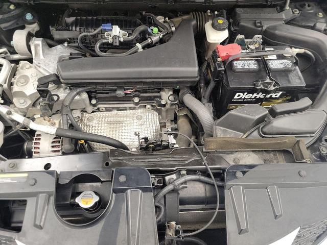 Photo of 2014 Green Nissan Rogue