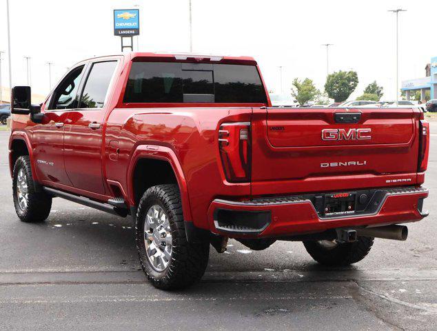 Photo of 2024 Volcanic Red Tintcoat GMC Sierra 2500