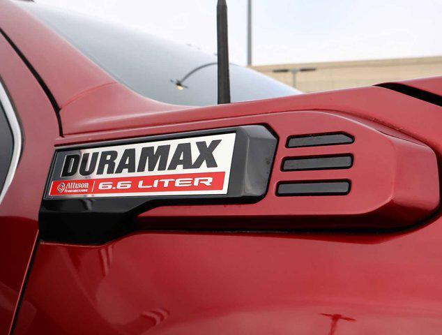 Photo of 2024 Volcanic Red Tintcoat GMC Sierra 2500
