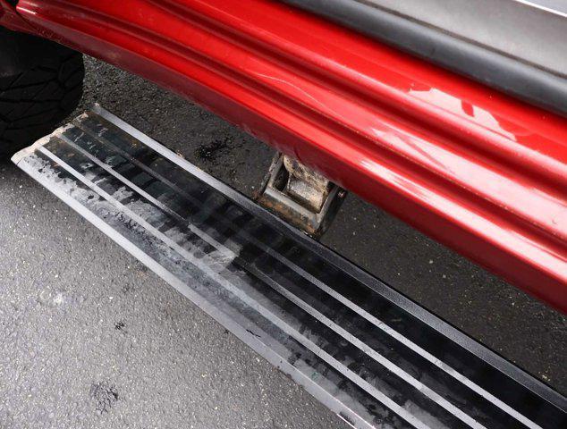 Photo of 2024 Volcanic Red Tintcoat GMC Sierra 2500