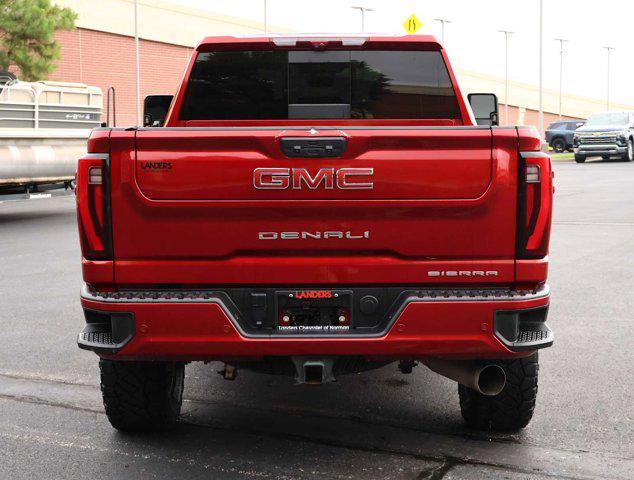 Photo of 2024 Volcanic Red Tintcoat GMC Sierra 2500
