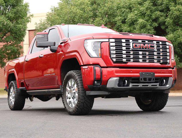 Photo of 2024 Volcanic Red Tintcoat GMC Sierra 2500