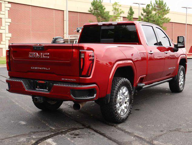 Photo of 2024 Volcanic Red Tintcoat GMC Sierra 2500
