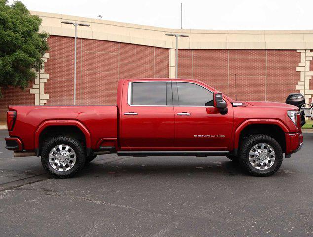 Photo of 2024 Volcanic Red Tintcoat GMC Sierra 2500