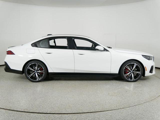 Photo of 2026 Alpine White BMW 550e