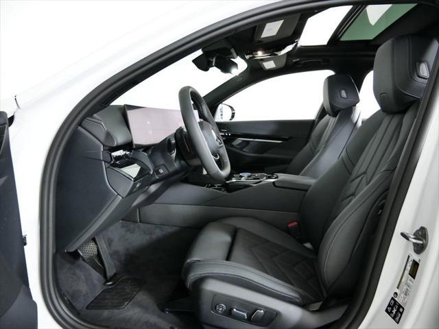 Photo of 2024 Mineral White Metallic BMW 530