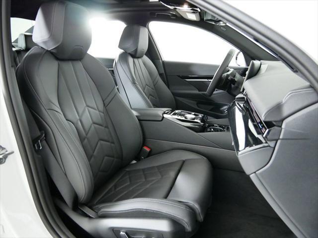 Photo of 2024 Mineral White Metallic BMW 530
