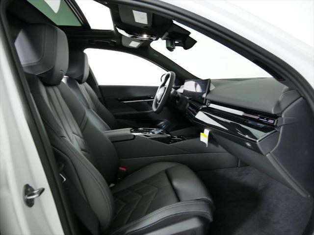 Photo of 2024 Mineral White Metallic BMW 530