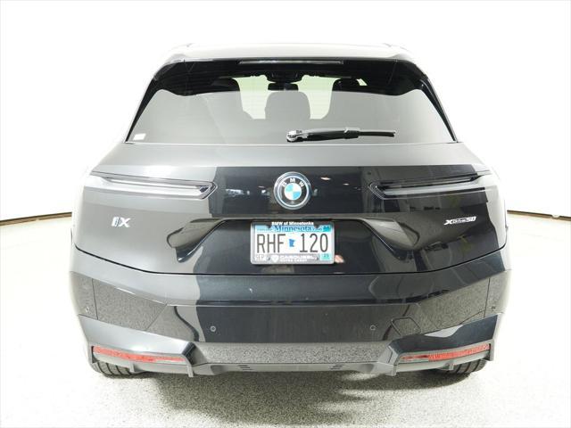 Photo of 2025 Black Sapphire Metallic BMW iX