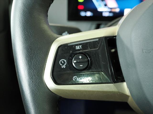 Photo of 2025 Black Sapphire Metallic BMW iX