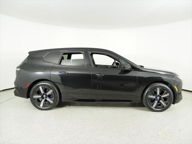 Photo of 2025 Black Sapphire Metallic BMW iX